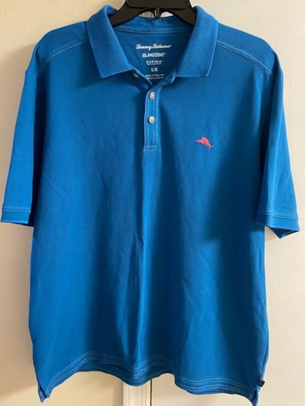 Tommy Bahama Men’s Bright Blue IslandZone Polo with Pink Dolphin Logo Large